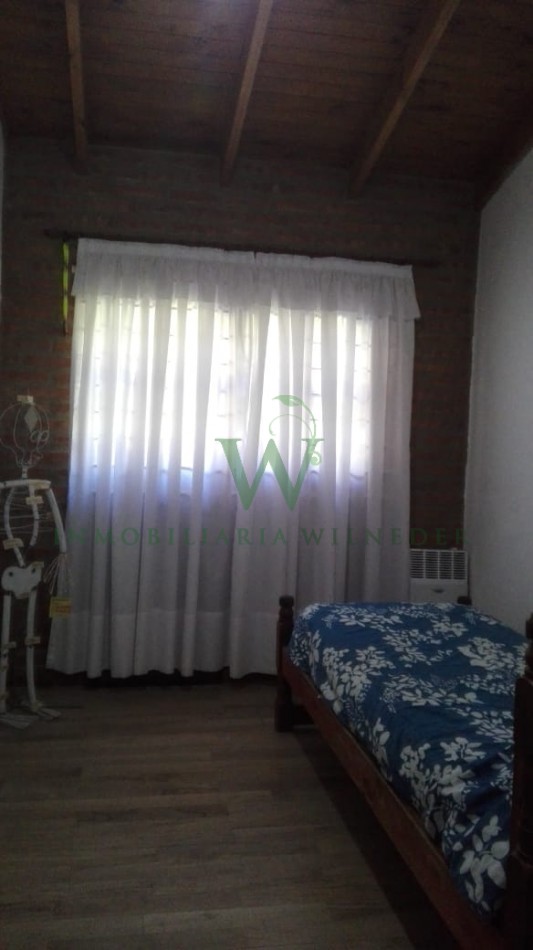 Casa con  5 dormitorios, 3 baños, gas natural . (COD 466)