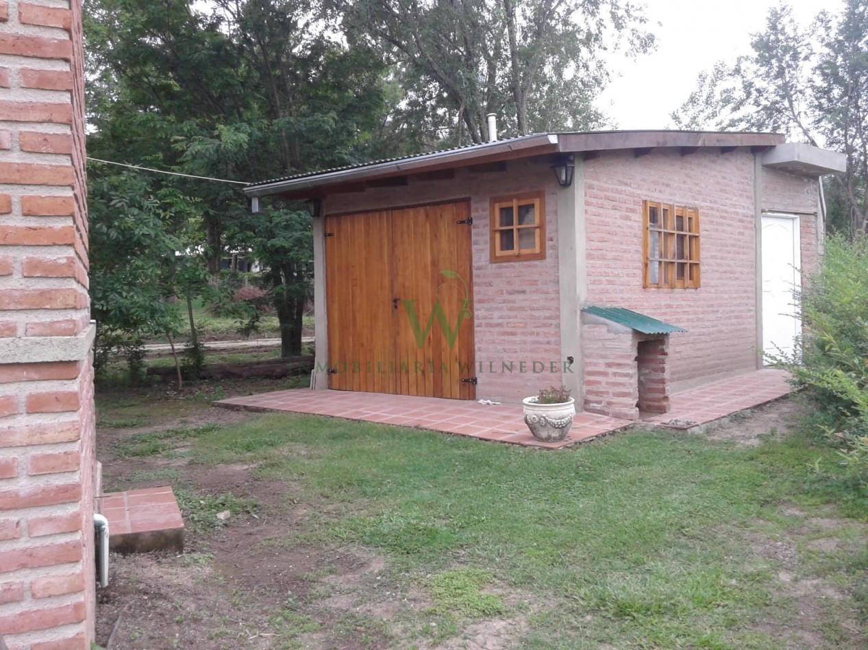 Casa 2 dormitorios + monoambiente y piscina. (COD 555)