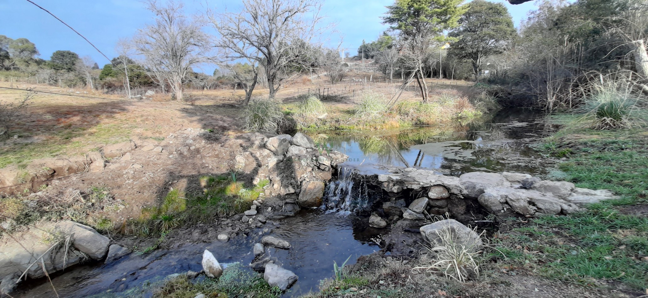 Terreno 9909m2 con costa de arroyo y vertiente, Villa General Belgrano 