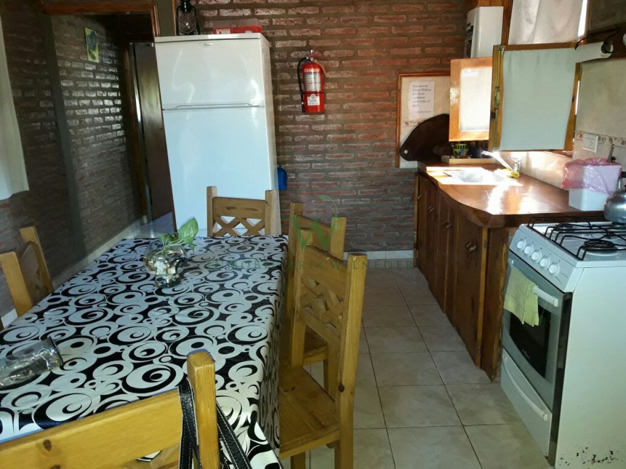 Casa 2 dormitorios + monoambiente y piscina. (COD 555)
