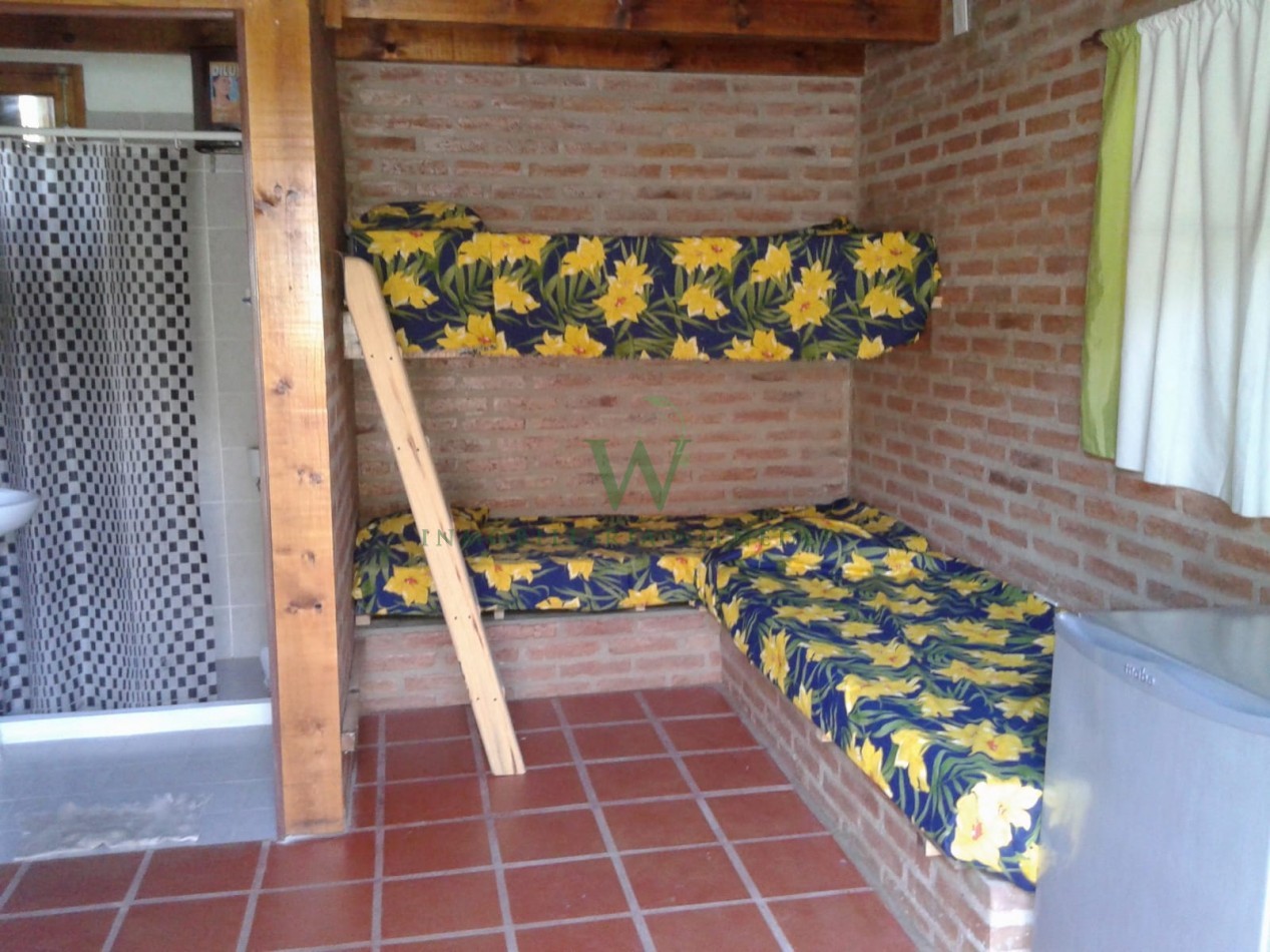 Casa 2 dormitorios + monoambiente y piscina. (COD 555)